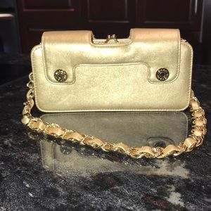 Isaac Mizrahi gold metallic handbag.